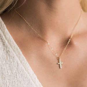Dainty gold cross necklace